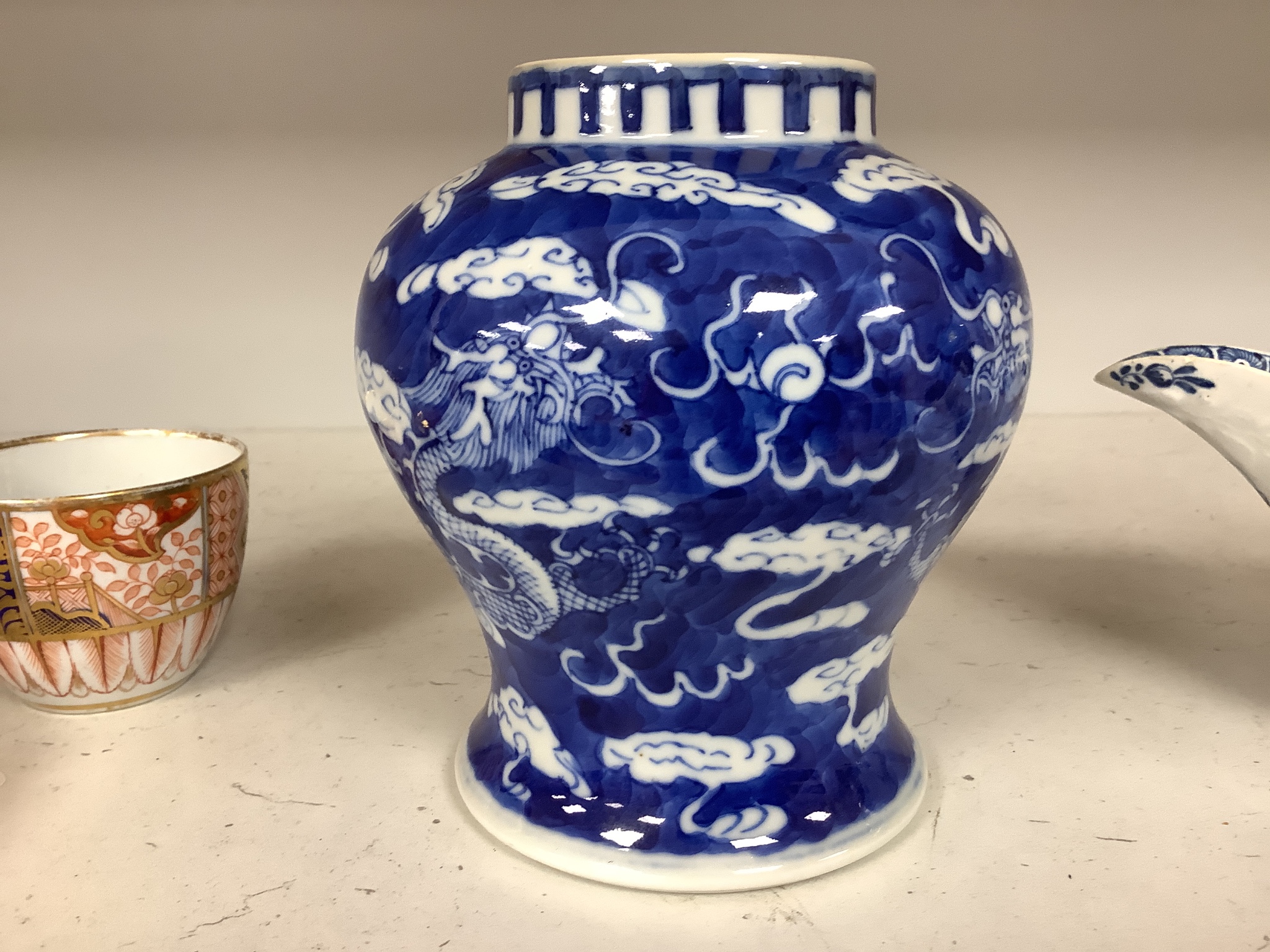 A Chinese blue and white 'dragon' vase, early 20th century, 15cm high